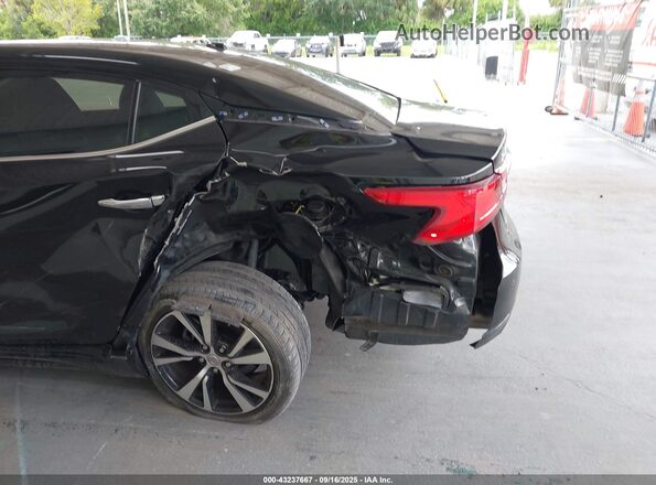 1N4AA6APXJC394340 2018 NISSAN MAXIMA Black Front view
