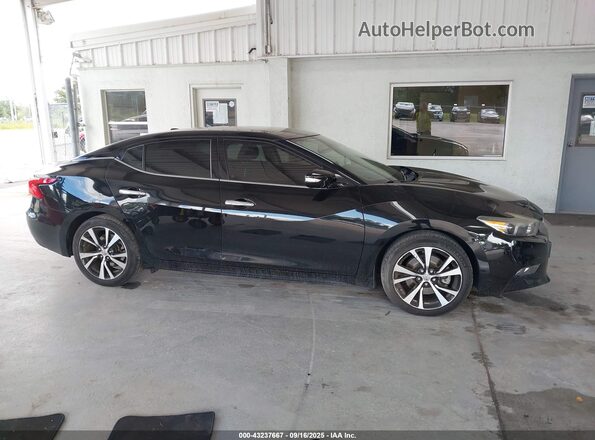 1N4AA6APXJC394340 2018 NISSAN MAXIMA Black Rear interior view
