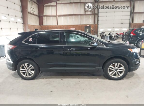 2FMPK4J90JBC23745 2018 FORD EDGE Black Вид задньої частини салону