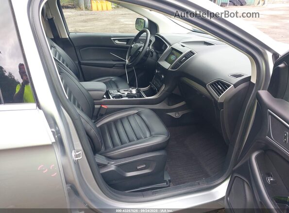 2FMPK4J93LBA97304 2020 FORD EDGE Серебряный Вид салона спереди