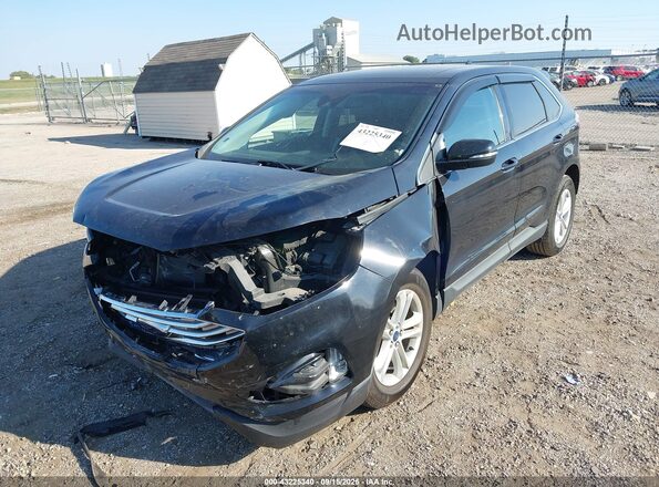 2FMPK4J95LBA25407 2020 FORD EDGE Черный Передняя левая четверть