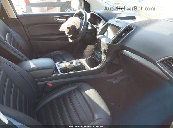 2FMPK4J95LBA25407 2020 FORD EDGE Черный Вид салона спереди