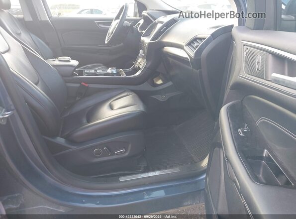 2FMPK4K91KBC48203 2019 FORD EDGE Blue Вид салону спереду