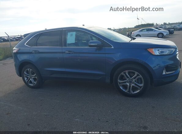 2FMPK4K91KBC48203 2019 FORD EDGE Blue Вид задньої частини салону