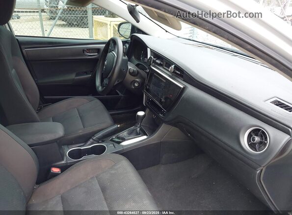 2T1BURHE8KC156961 2019 TOYOTA LL Silver წინა სალონის ხედი