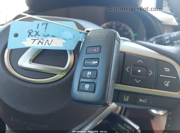 2T2ZZMCA5HC051709 2017 LEXUS RX 350 Gold Widok deski rozdzielczej