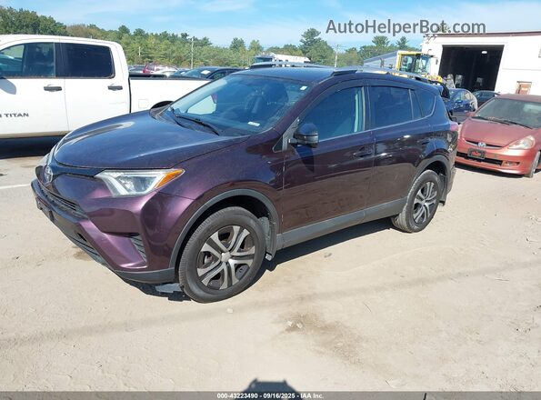 2T3BFREV0GW455601 2016 TOYOTA LE Burgundy Vista tres cuartos delantera izquierda