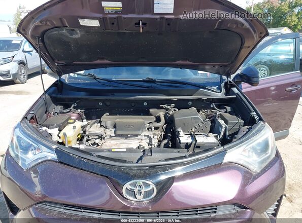 2T3BFREV0GW455601 2016 TOYOTA LE Burgundy Vista trasera