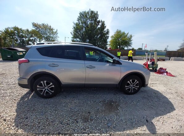 2T3BFREV7GW481404 2016 TOYOTA LE Серебряный Вид задней части салона