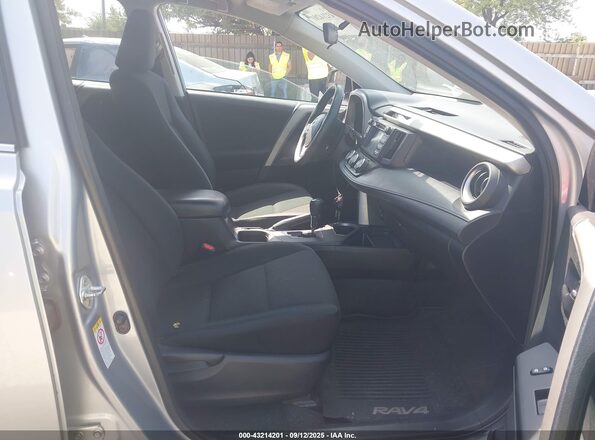 2T3BFREV7GW481404 2016 TOYOTA LE Серебряный Вид салона спереди