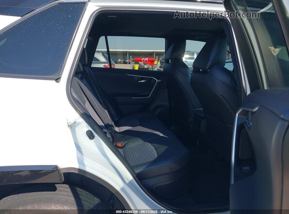 2T3E6RFV0NW032218 2022 TOYOTA RAV4 HYBRID White VIN sticker view