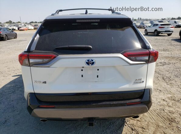 2T3E6RFV2MW027505 2021 TOYOTA RAV4 White Rear view