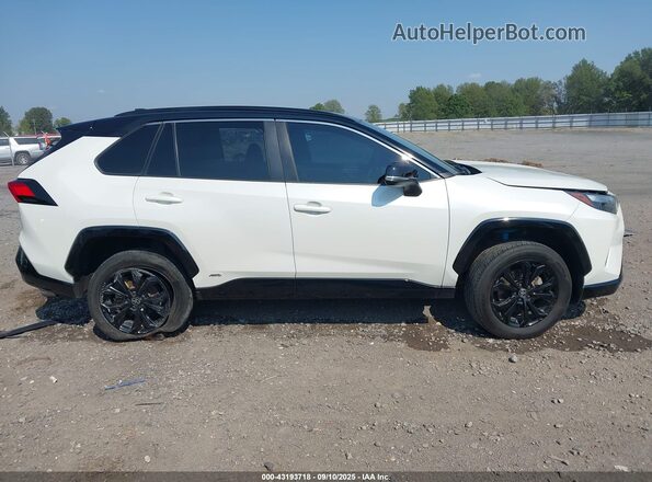 2T3E6RFV4NW031007 2022 TOYOTA RAV4 HYBRID White Rear interior view
