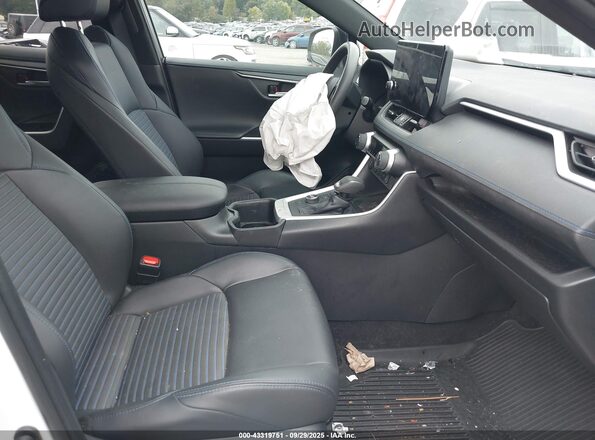 2T3E6RFV5PW038552 2023 TOYOTA RAV4 White Front interior view