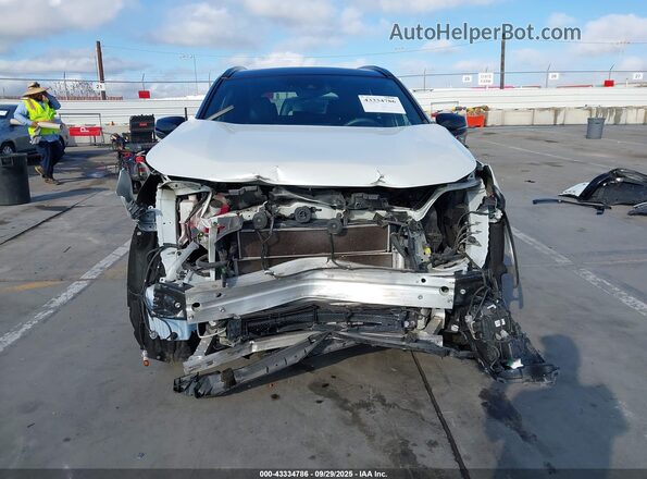2T3EWRFV9LW047930 2020 TOYOTA RAV4 HYBRID White Вид задньої частини салону