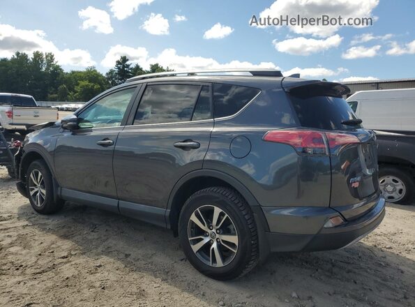2T3RFREV4JW849611 2018 TOYOTA RAV4 Gray 