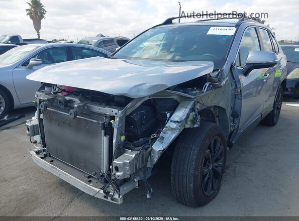 2T3T6RFV1NW030601 2022 TOYOTA RAV4 HYBRID Silver Widok z przodu