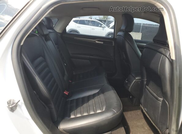 3FA6P0CD6KR233944 2019 FORD FUSION White Vista interior trasera