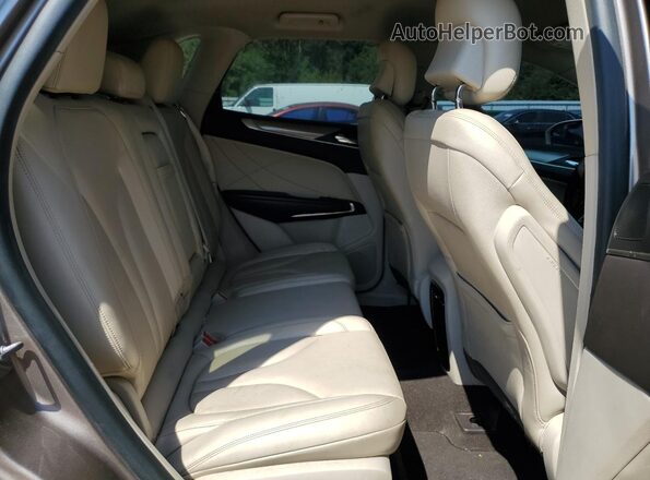 5LMCJ1C90KUL46144 2019 LINCOLN MKZ Gold Սալոնի հետևի տեսք