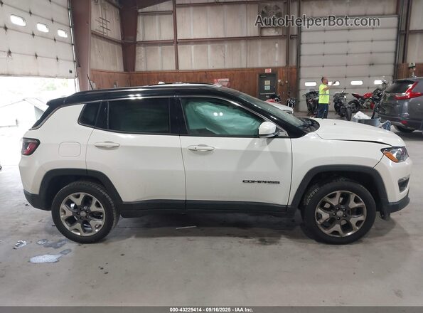 3C4NJDCB0LT154061 2020 JEEP COMPASS White Սալոնի հետևի տեսք