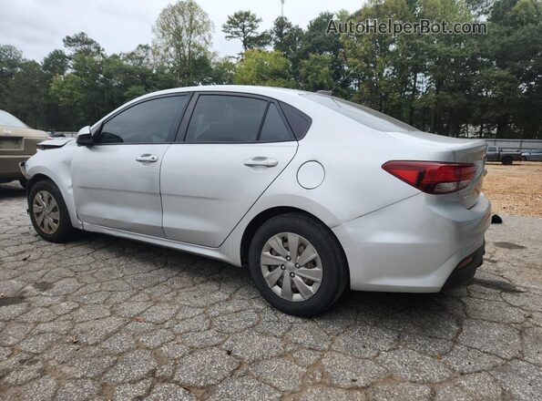 3KPA24AD7LE294158 2020 KIA RIO Silver Trasero izquierdo