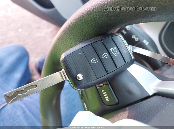 3KPA24AD7PE565614 2023 KIA RIO Gray წინა პანელის ხედი