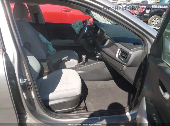 3KPA24AD7PE565614 2023 KIA RIO Gray წინა სალონის ხედი