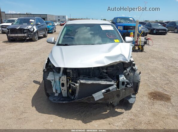 3KPA24AD8LE358773 2020 KIA RIO Серебряный Вид задней части салона