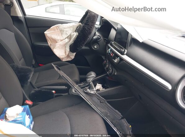 3KPF24AD2PE642878 2023 KIA FORTE Gray Vista interior delantera
