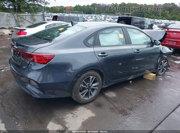 3KPF24AD2PE642878 2023 KIA FORTE Gray Trasero derecho