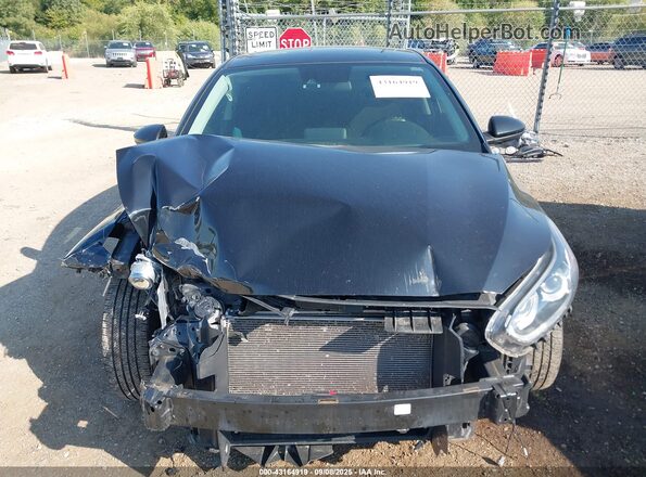 3KPF24ADXLE229990 2020 KIA FORTE Black Rear interior view