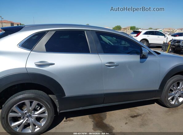 3MVDMBBL6MM271445 2021 MAZDA CX-30 Silver Rear interior view