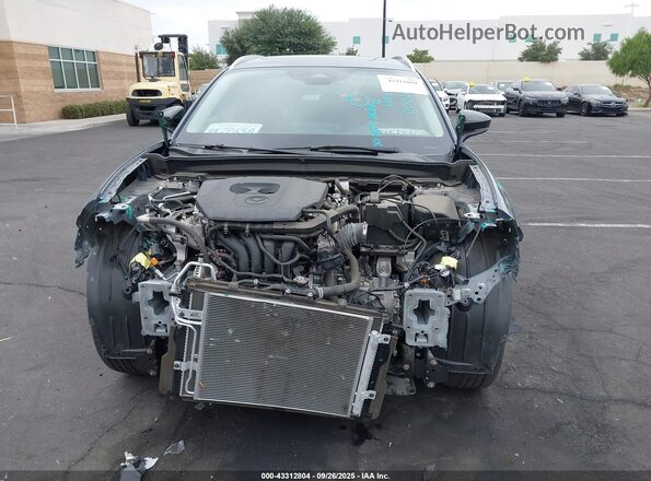 3MVDMBCM0RM604480 2024 MAZDA CX-30 Gray Rear interior view