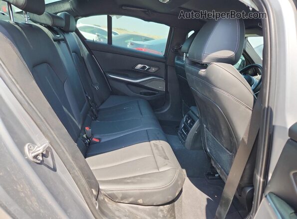 3MW49FF07P8C79977 2023 BMW M3 Серый Вид задней части салона