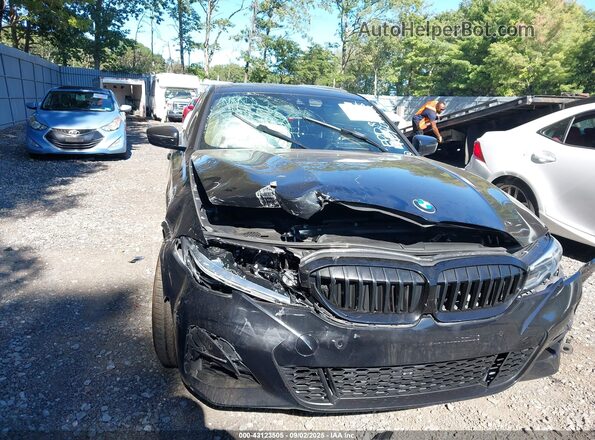 3MW5R1J06L8B07772 2020 BMW 3 SERIES Black Front view