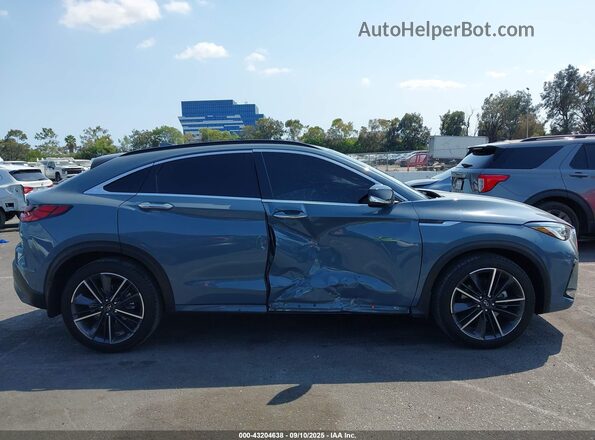 3PCAJ5JR6PF110476 2023 INFINITI QX55 Light Blue Rear interior view