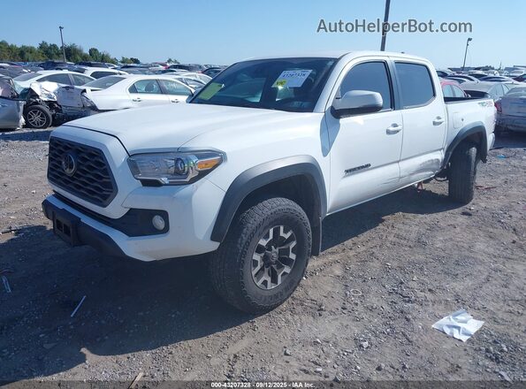 3TMCZ5AN5LM329238 2020 TOYOTA TACOMA White Vista tres cuartos delantera izquierda