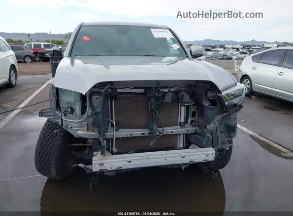 3TMCZ5AN7MM413496 2021 TOYOTA TACOMA Silver Widok wnętrza z tyłu