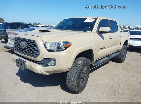 3TMCZ5AN9LM303449 2020 TOYOTA TACOMA Коричневый Передняя левая четверть