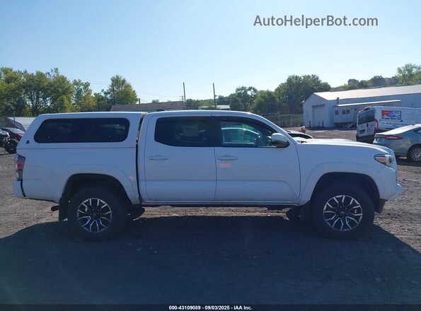 3TMCZ5AN9LM341733 2020 TOYOTA TACOMA Белый Вид задней части салона