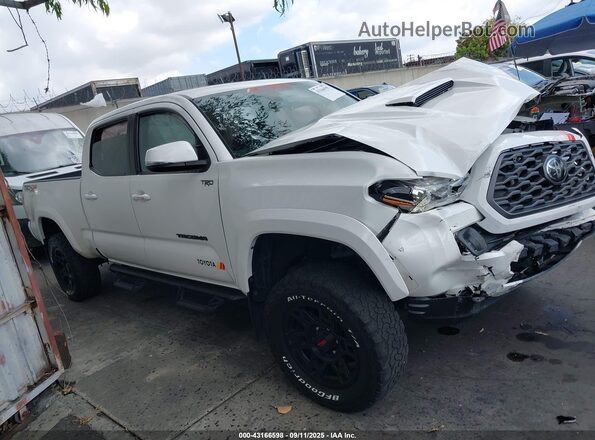3TMDZ5BN7MM115341 2021 TOYOTA TACOMA White Widok wnętrza z tyłu