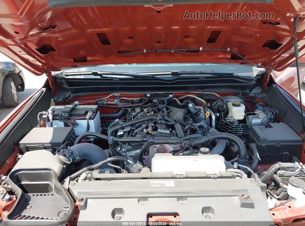 3TMKB5FN9SM035400 2025 TOYOTA TACOMA Orange Вид ззаду
