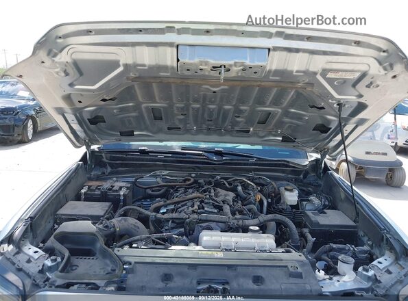 3TYKD5HN5RT009771 2024 TOYOTA TACOMA Silver Հետևի տեսք