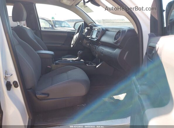 3TYRX5GN6MT031312 2021 TOYOTA TACOMA White Вид салону спереду
