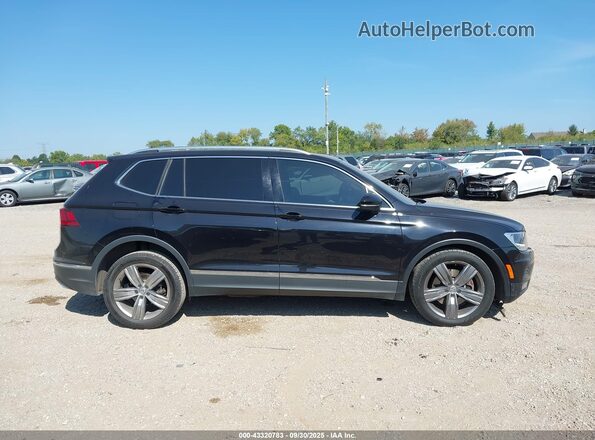 3VV2B7AX7LM096848 2020 VOLKSWAGEN TIGUAN Black Vista interior trasera