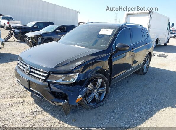 3VV2B7AX7LM096848 2020 VOLKSWAGEN TIGUAN Black Vista tres cuartos delantera izquierda