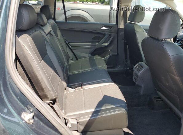 3VV2B7AX8KM190624 2019 VOLKSWAGEN TIGUAN Green Rear interior view