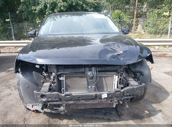 3VV3B7AX9MM044000 2021 VOLKSWAGEN TIGUAN Черный Вид задней части салона