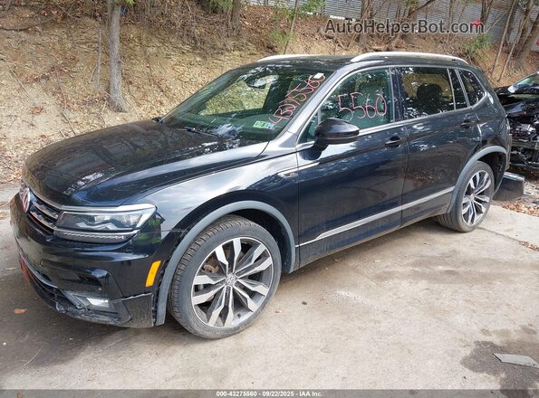 3VV4B7AX6MM071871 2021 VOLKSWAGEN TIGUAN Navy Առջևի ձախ երեք քառորդ տեսարան