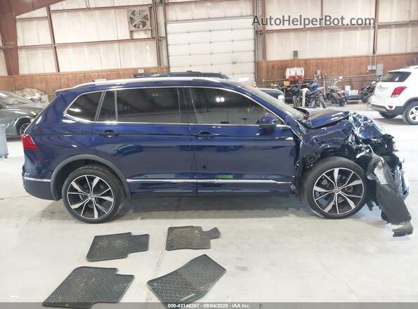 3VV4B7AX6NM100884 2022 VOLKSWAGEN TIGUAN Blue Vista interior trasera